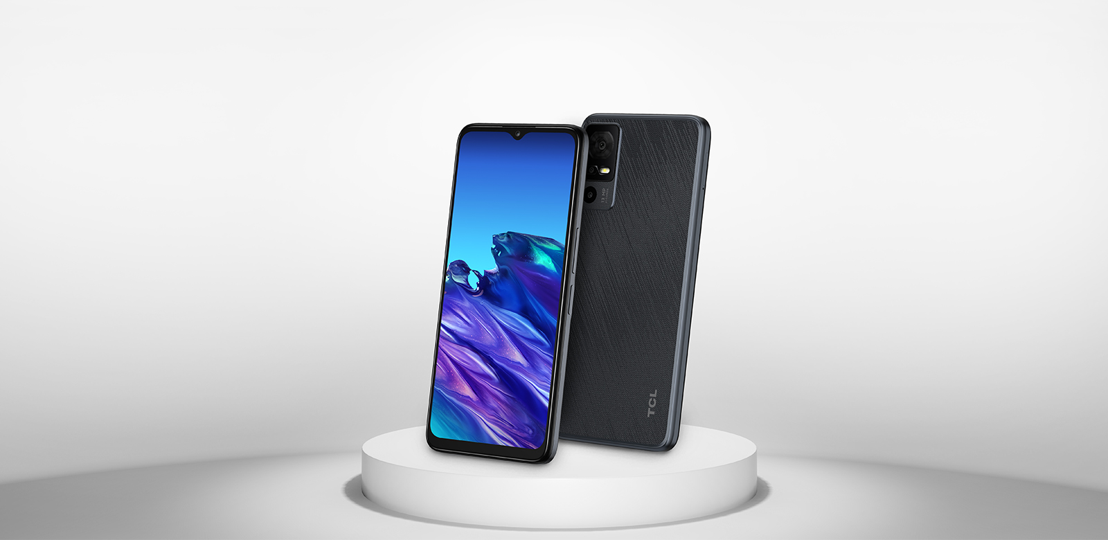 Phone displayed on small pedestal