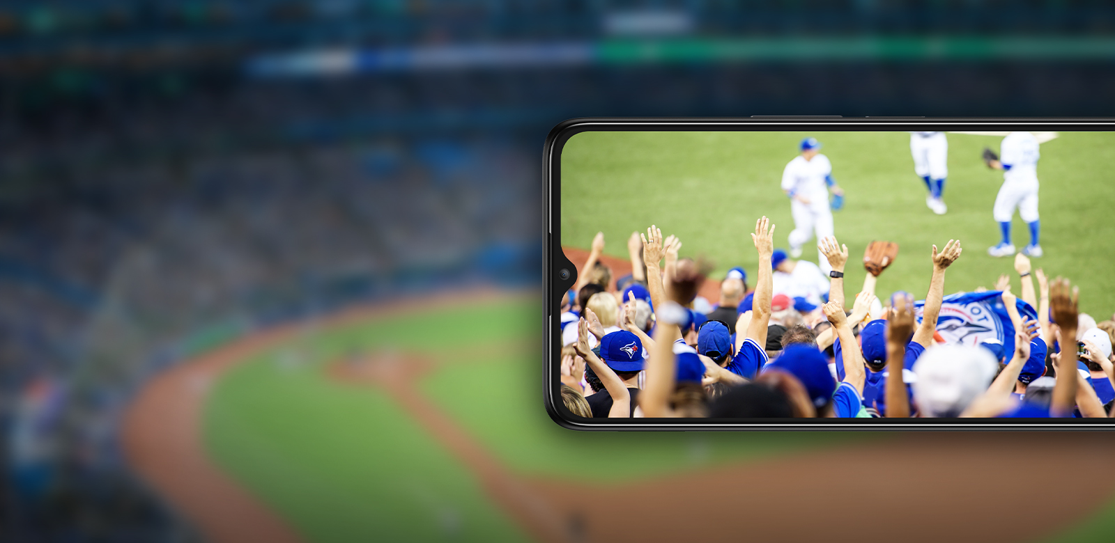 phone with Toronto Blue Jays fans watching field
