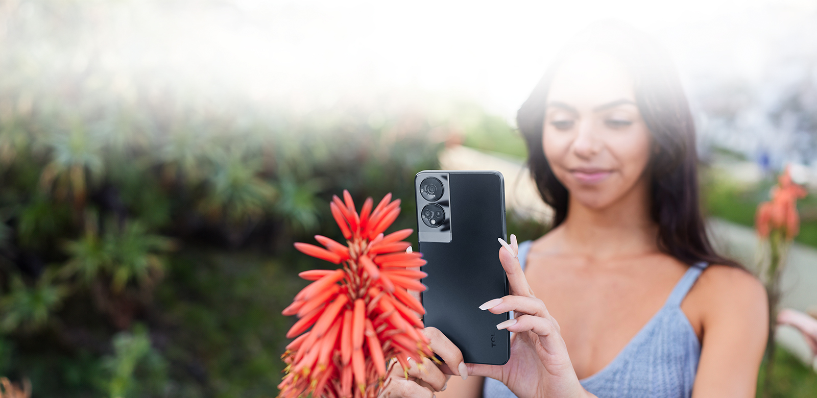 woman taking a photo with phone