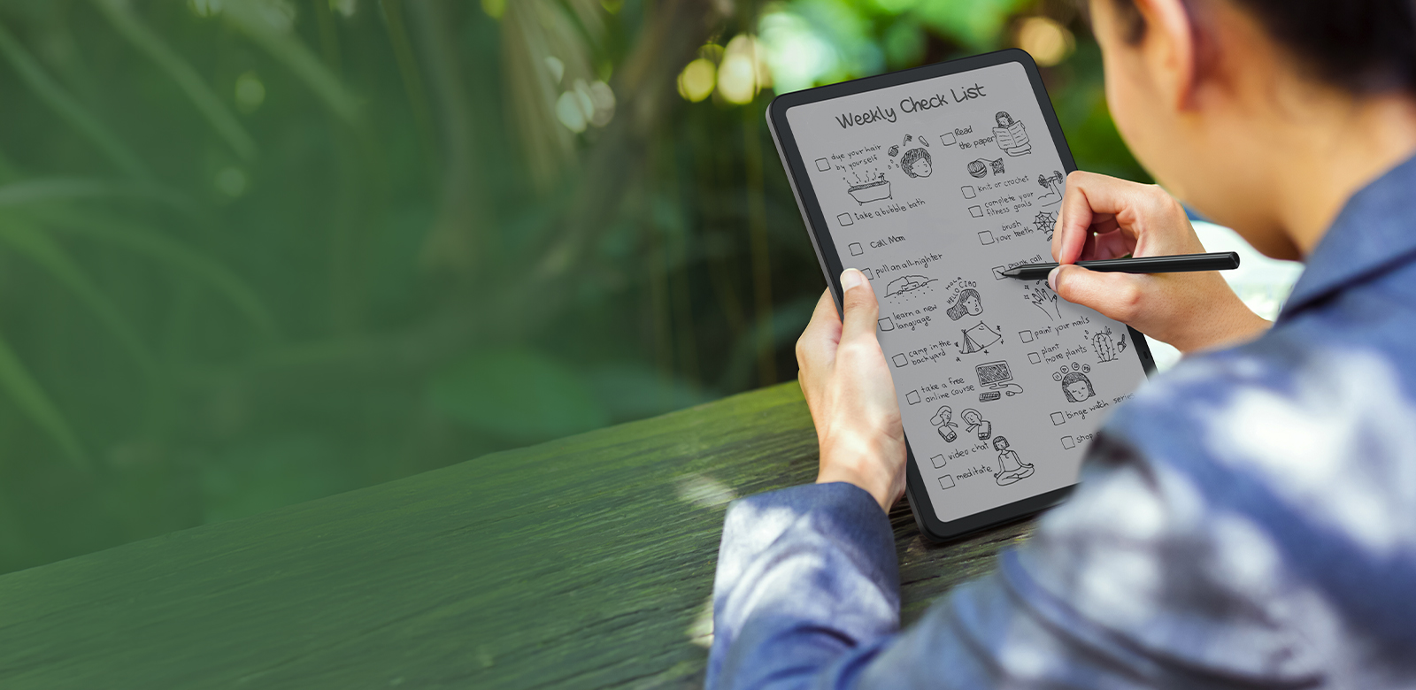 man taking notes on tablet throughout the day